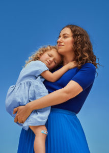 Ritual Founder & CEO Katerina Schneider holding her daughter
