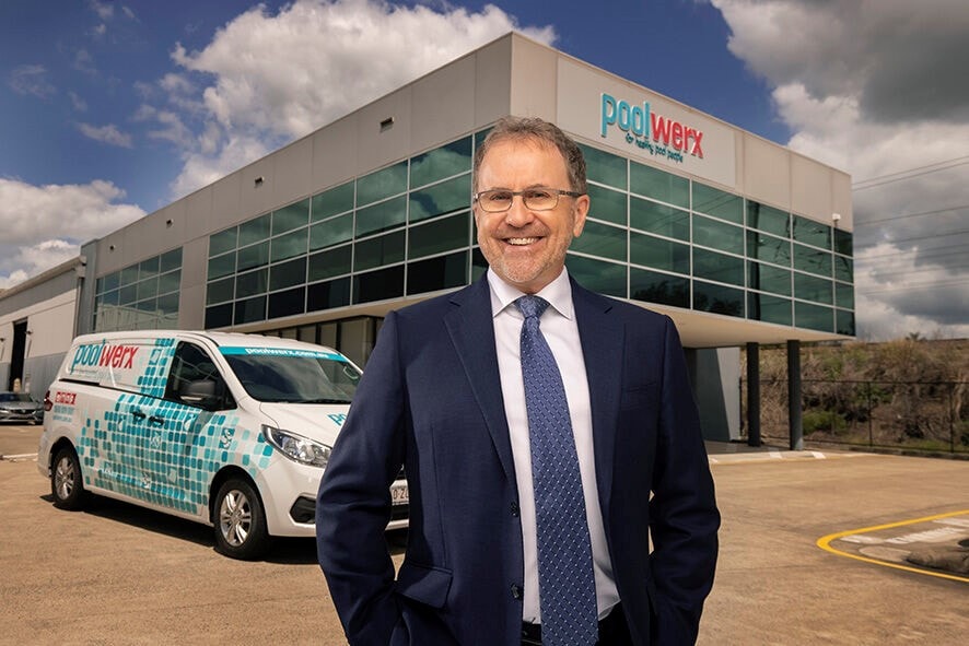 Poolwerx founder and CEO John O’Brien in front of a Poolwerx retail store.