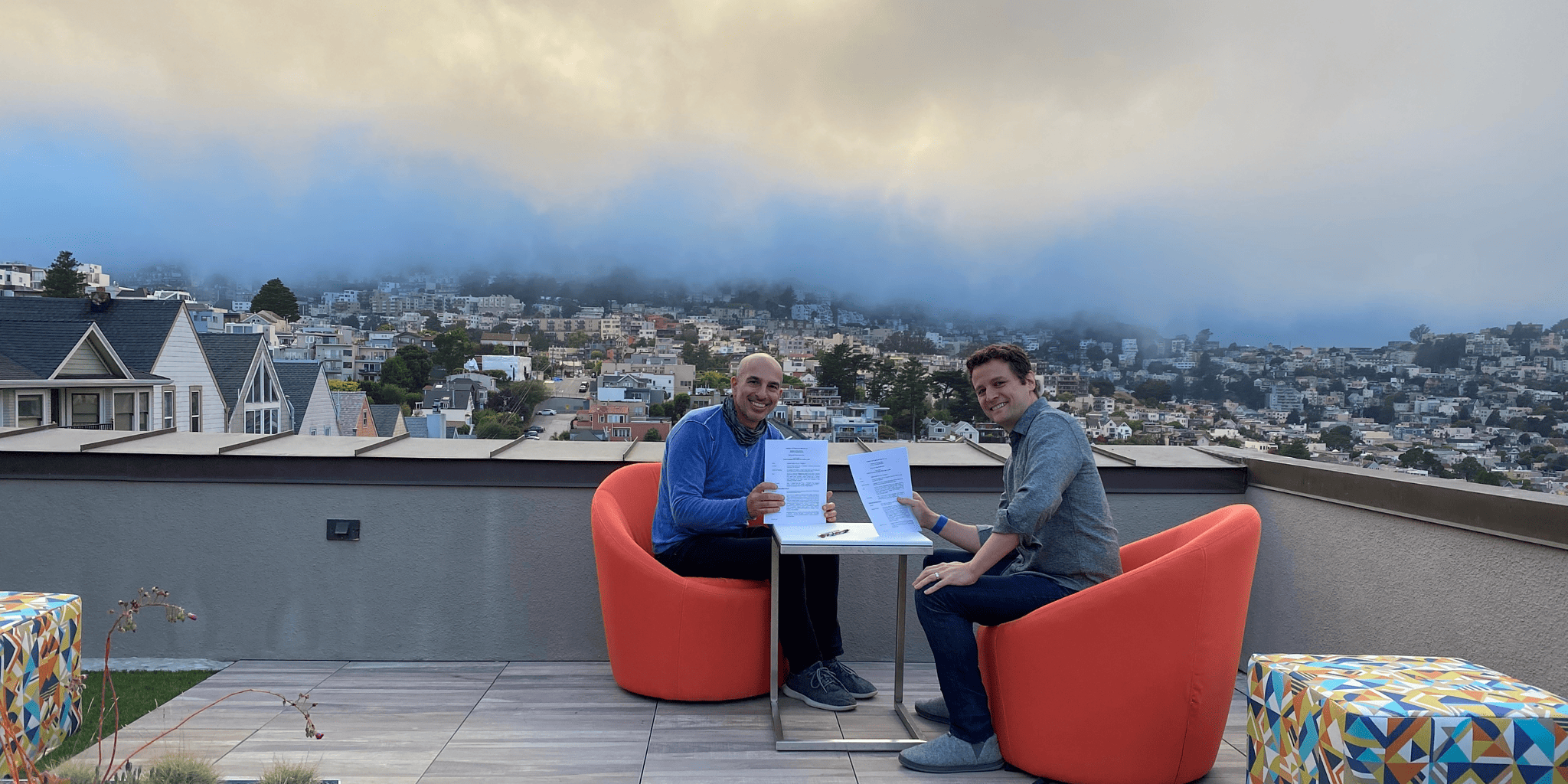 two men on a rooftop