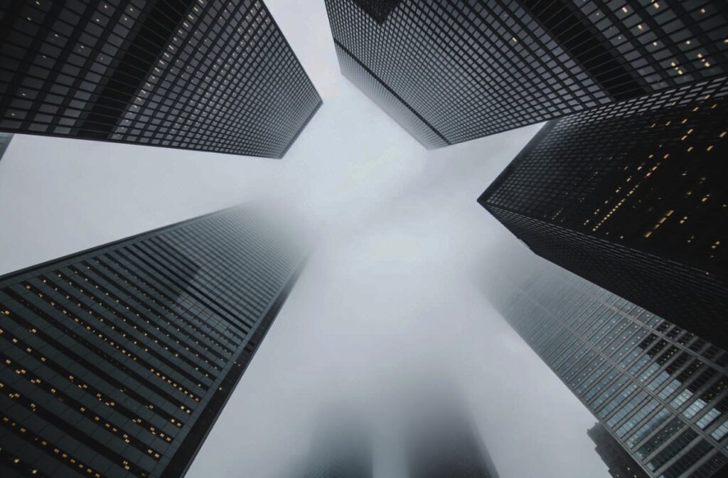 skyscrapers in fog