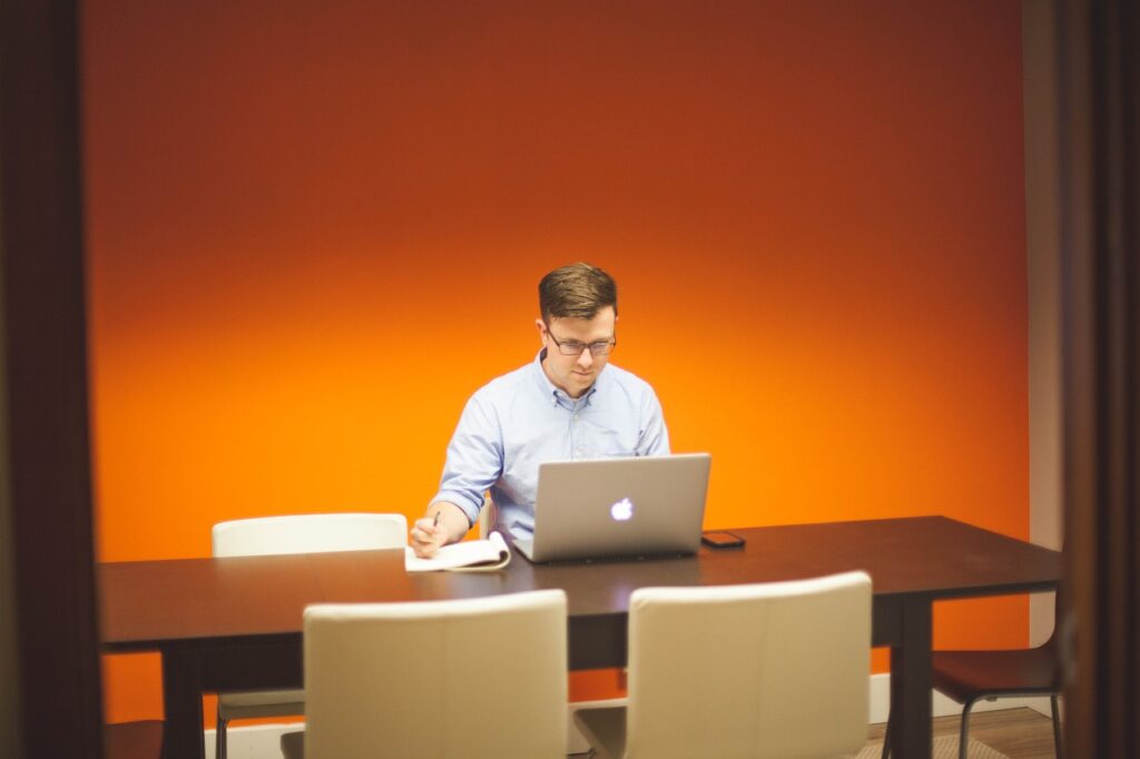 man using laptop