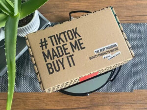 A cardboard box with Hashtag TikTok Made Me Do It written on the top
