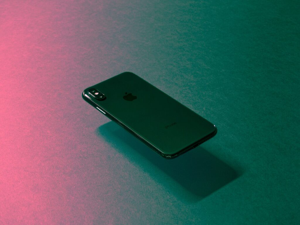 iPhone on colored background